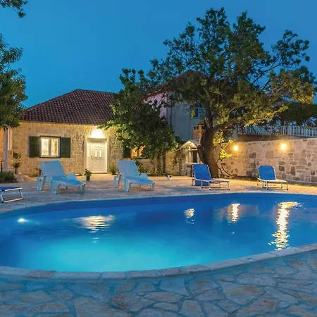Four-bedroom In Hébergement de vacances
